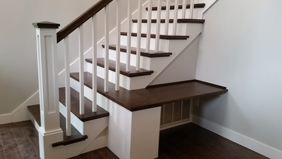 Custom stair and handrail system with built-in seating bench