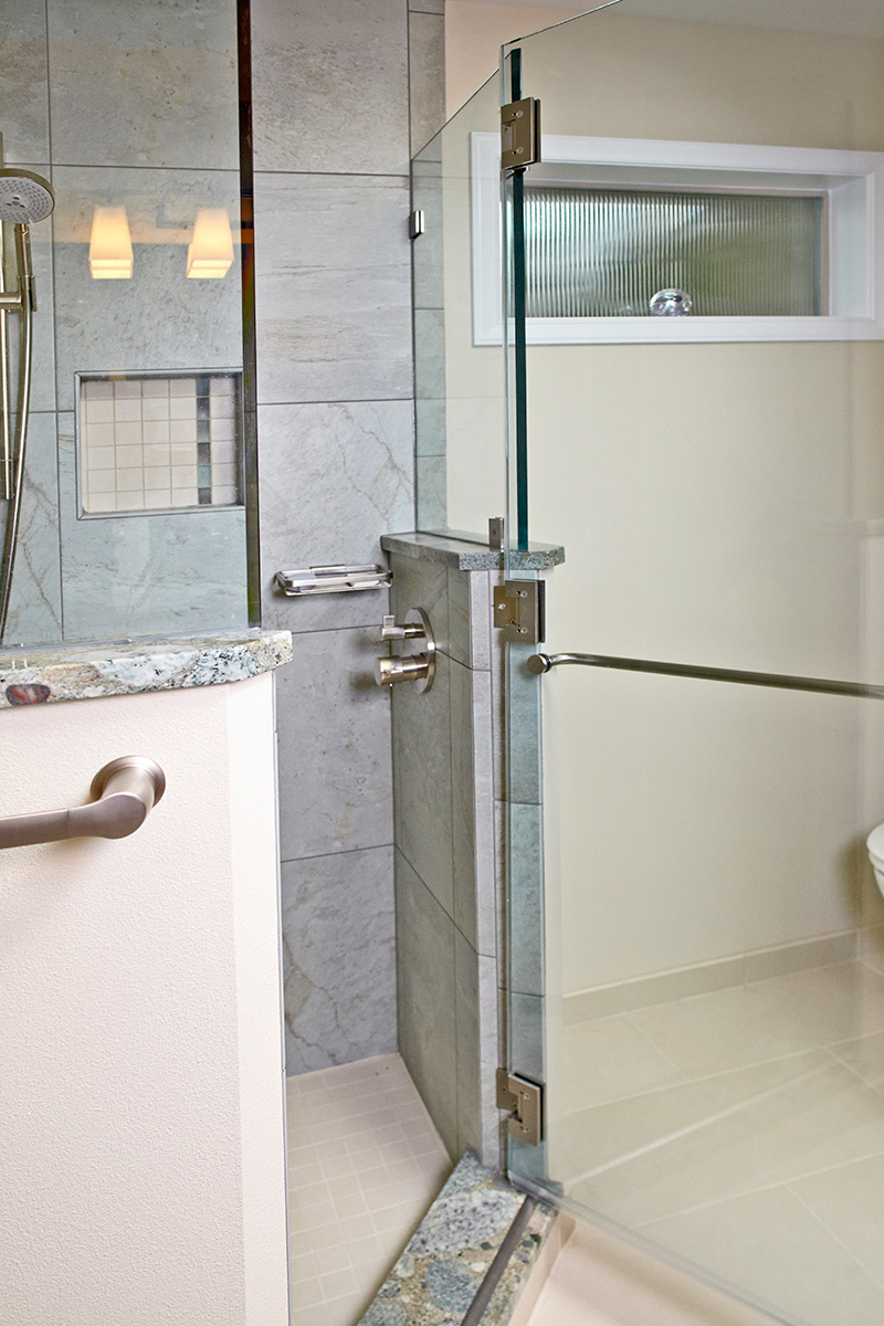 Custom-built shower with frameless shower door