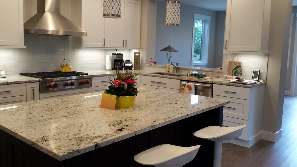 Our work included adding a gourmet kitchen with modular cabinets with granite countertops