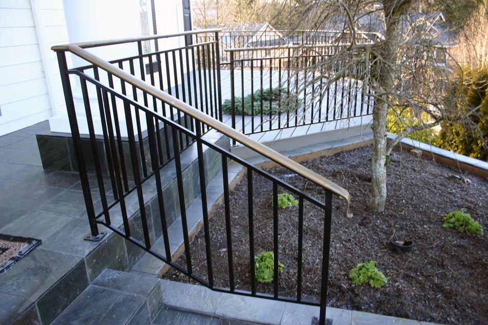 Completed handrail with a polished brass patina