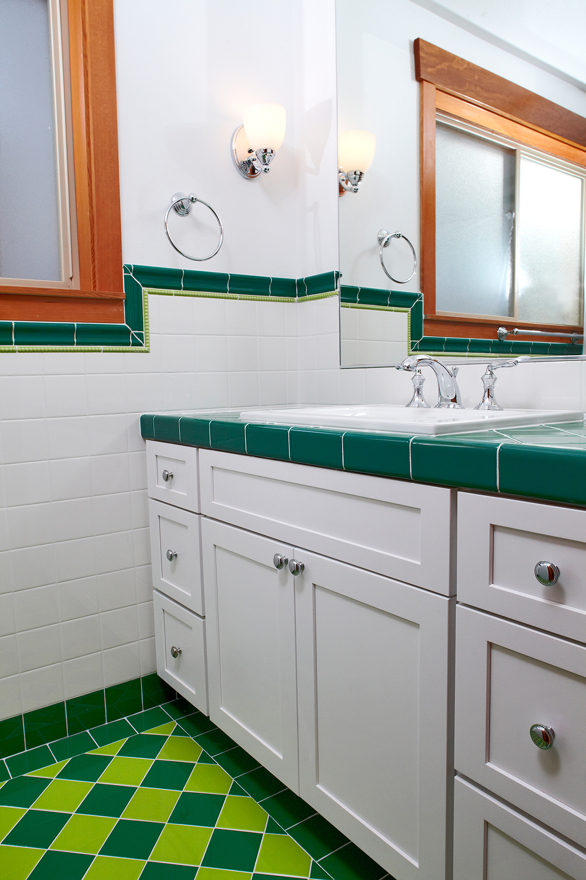 The homeowner wanted to bring some color into this bathroom and still be with the era of the house for design